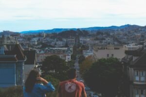 woman and man looking at houses